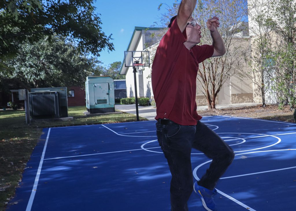 Jarret playing basketball